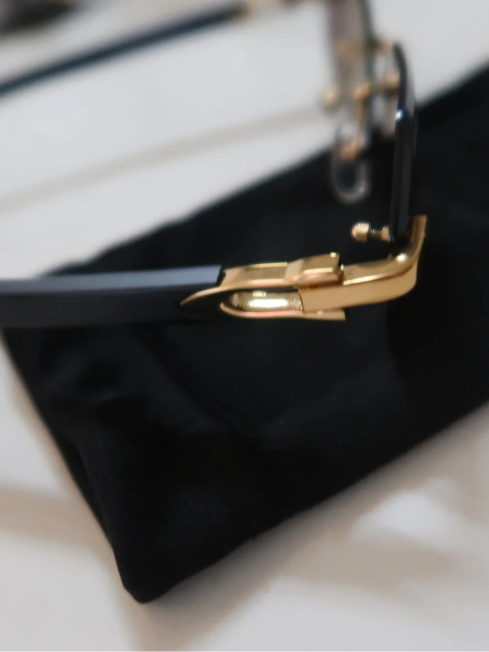 Geometric Rimless Sunglasses — Black & Gold Accents